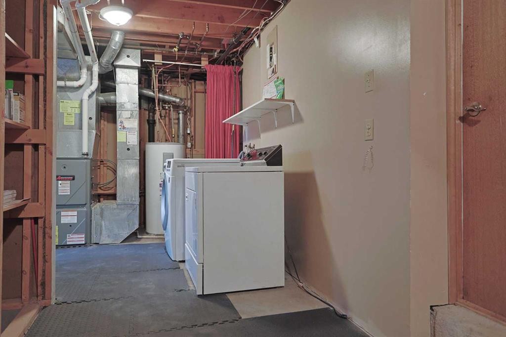 4904 Verulum Place Nw, Calgary, AB - Indoor Photo Showing Laundry Room