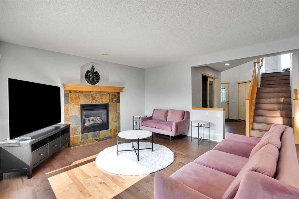 101 Royal Oak Crescent Nw, Calgary, AB - Indoor Photo Showing Living Room With Fireplace