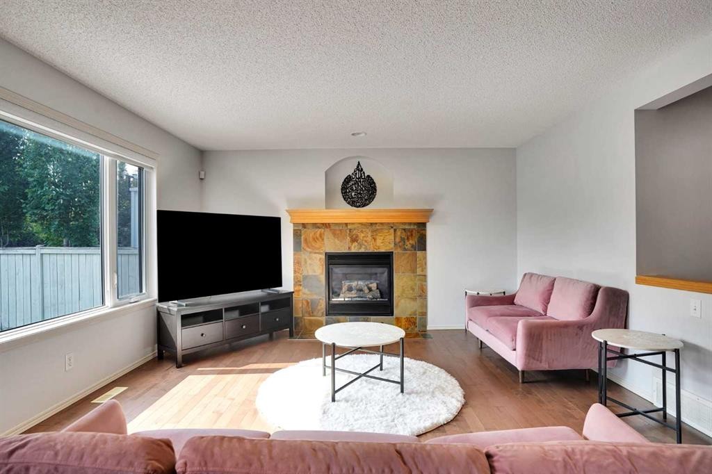 101 Royal Oak Crescent Nw, Calgary, AB - Indoor Photo Showing Living Room With Fireplace