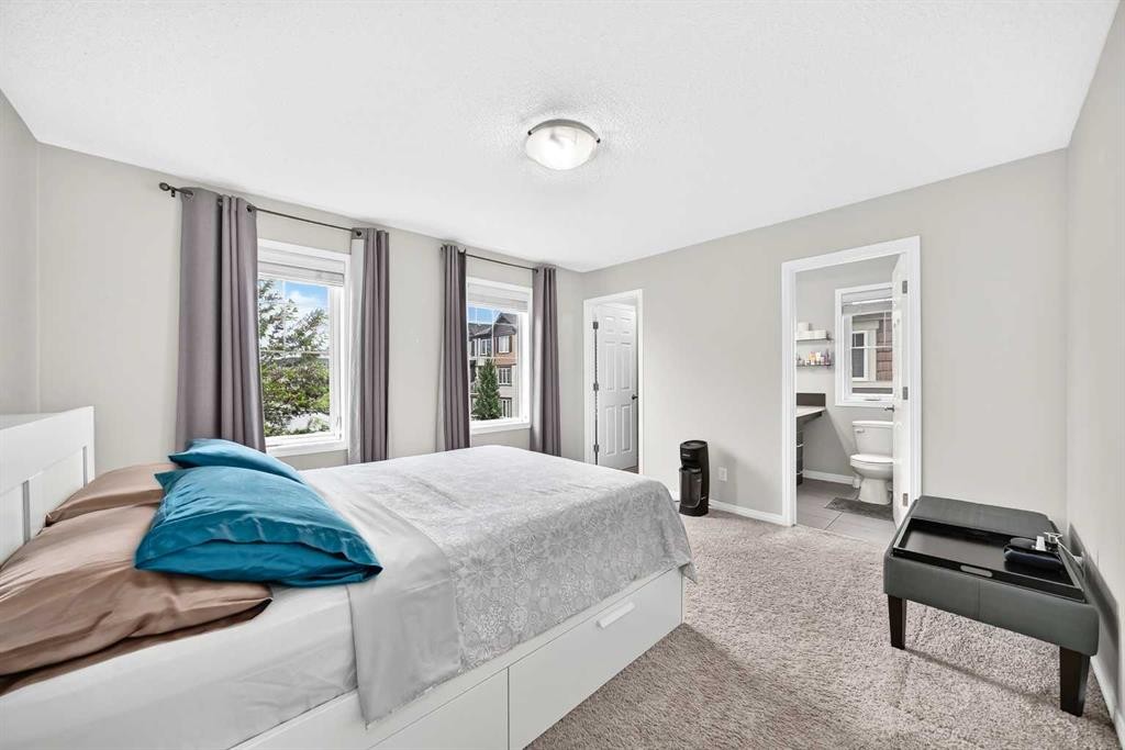 535 Windstone Common Sw, Airdrie, AB - Indoor Photo Showing Bedroom