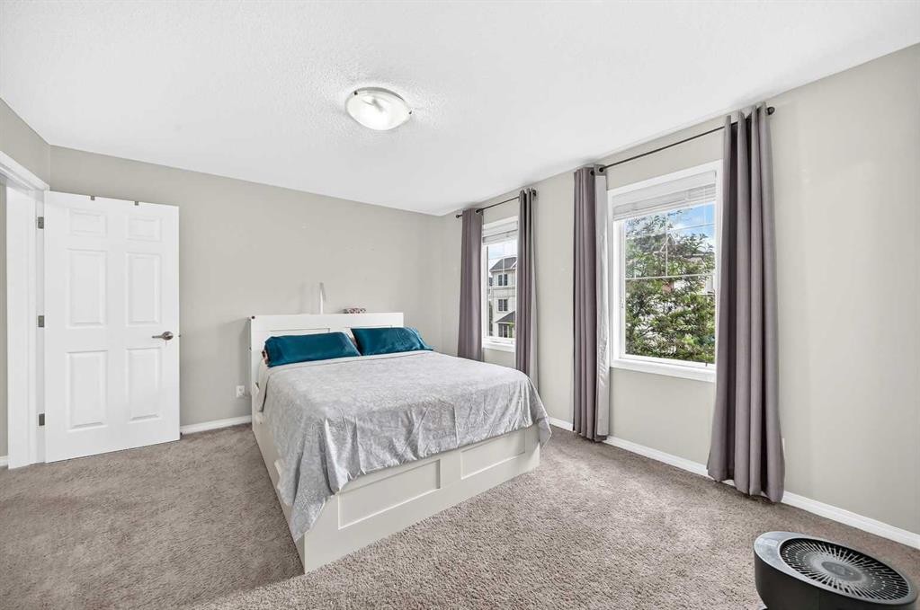 535 Windstone Common Sw, Airdrie, AB - Indoor Photo Showing Bedroom