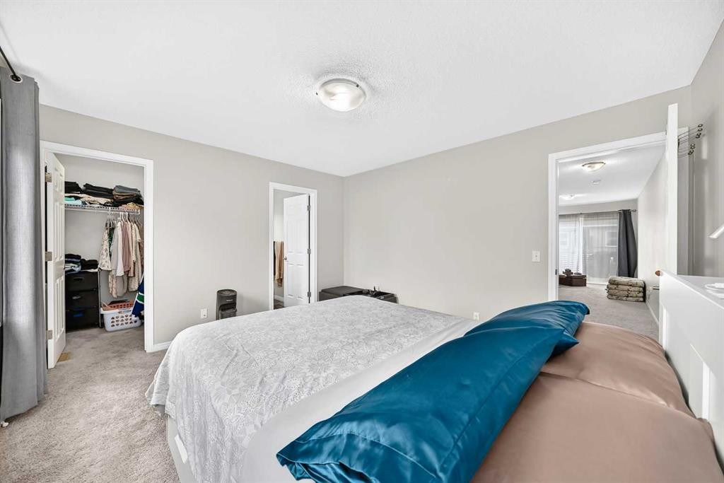 535 Windstone Common Sw, Airdrie, AB - Indoor Photo Showing Bedroom