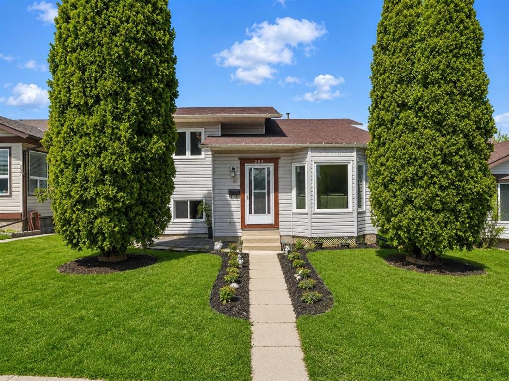 203 Shawglen Road Sw, Calgary, AB - Outdoor With Facade