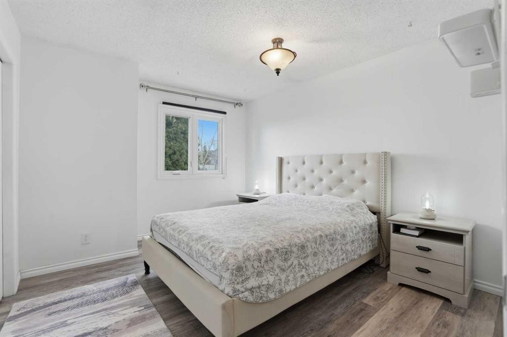 203 Shawglen Road Sw, Calgary, AB - Indoor Photo Showing Bedroom