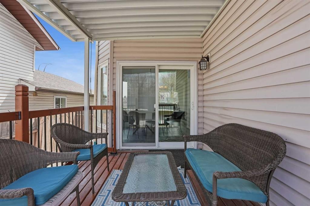 203 Shawglen Road Sw, Calgary, AB - Outdoor With Deck Patio Veranda With Exterior