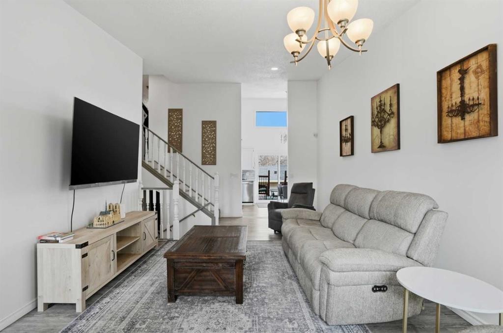 203 Shawglen Road Sw, Calgary, AB - Indoor Photo Showing Living Room
