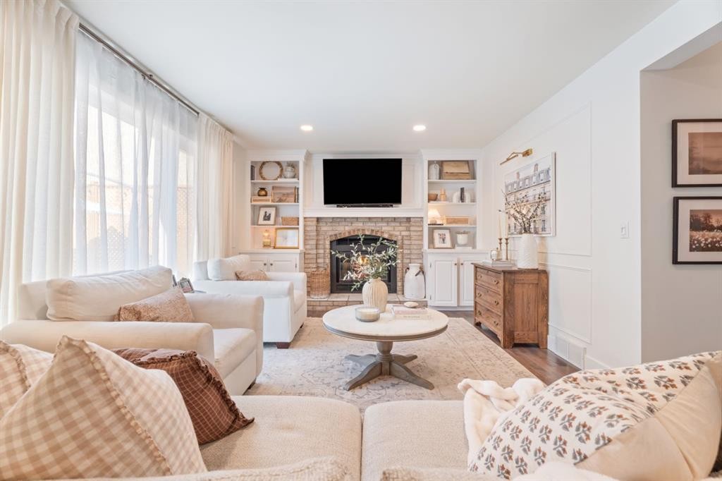 36 Sunvista Place Se, Calgary, AB - Indoor Photo Showing Living Room With Fireplace