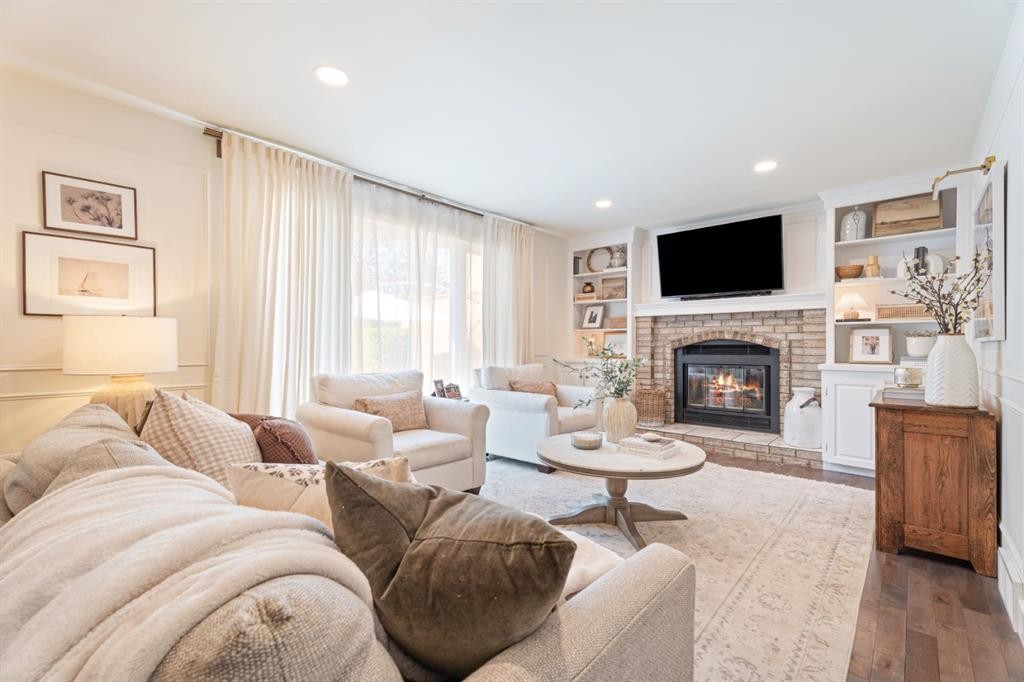 36 Sunvista Place Se, Calgary, AB - Indoor Photo Showing Living Room With Fireplace