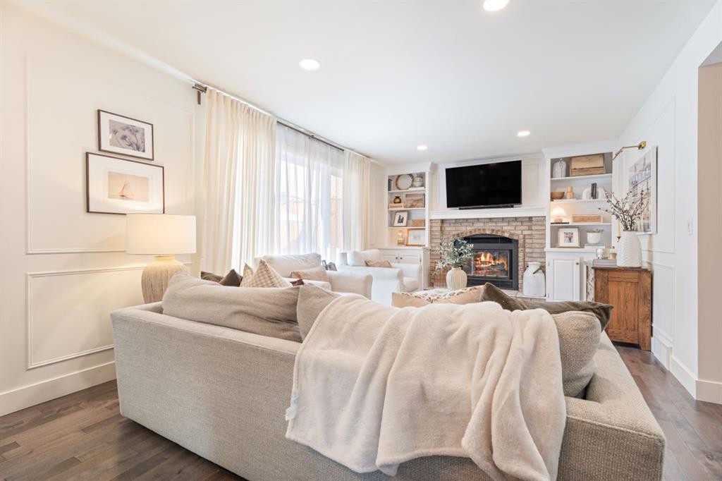 36 Sunvista Place Se, Calgary, AB - Indoor Photo Showing Living Room With Fireplace