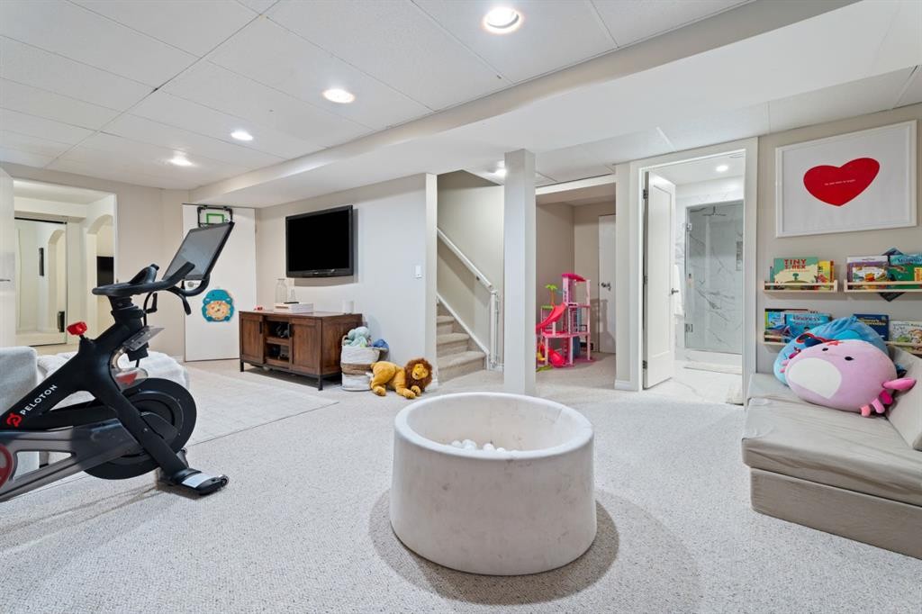36 Sunvista Place Se, Calgary, AB - Indoor Photo Showing Gym Room
