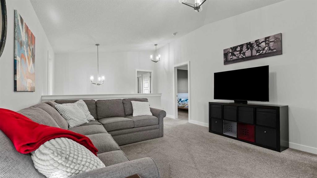 152 Threepoint Cove, Okotoks, AB - Indoor Photo Showing Living Room