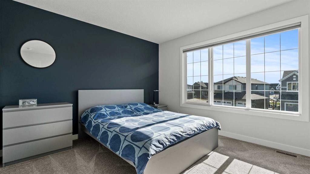 152 Threepoint Cove, Okotoks, AB - Indoor Photo Showing Bedroom