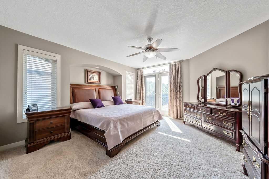 259 Willow Ridge Manor, Diamond Valley, AB - Indoor Photo Showing Bedroom