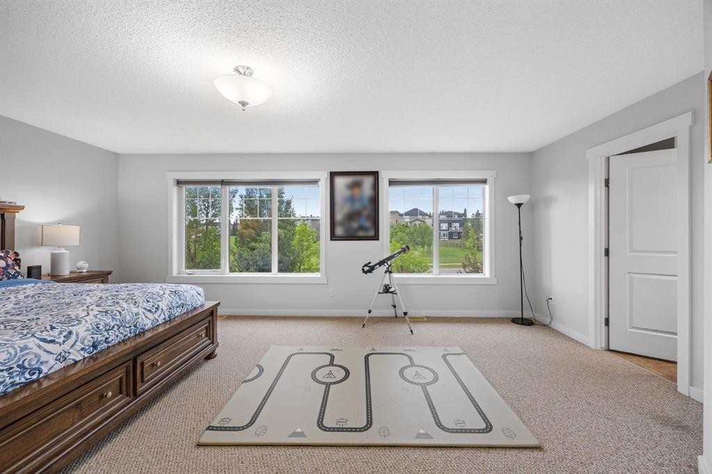 575 Evergreen Circle Sw, Calgary, AB - Indoor Photo Showing Bedroom