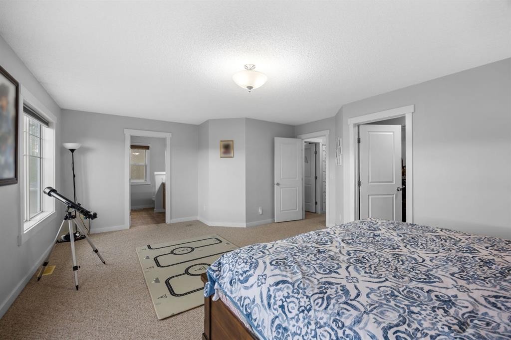 575 Evergreen Circle Sw, Calgary, AB - Indoor Photo Showing Bedroom