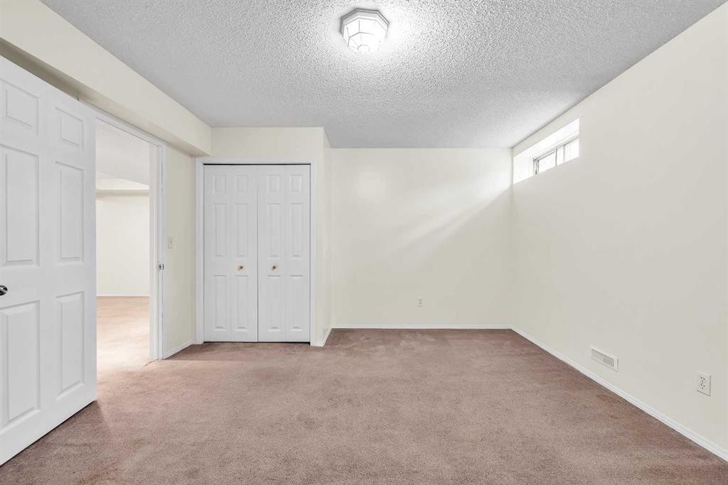 68 Catalina Circle Ne, Calgary, AB - Indoor Photo Showing Other Room