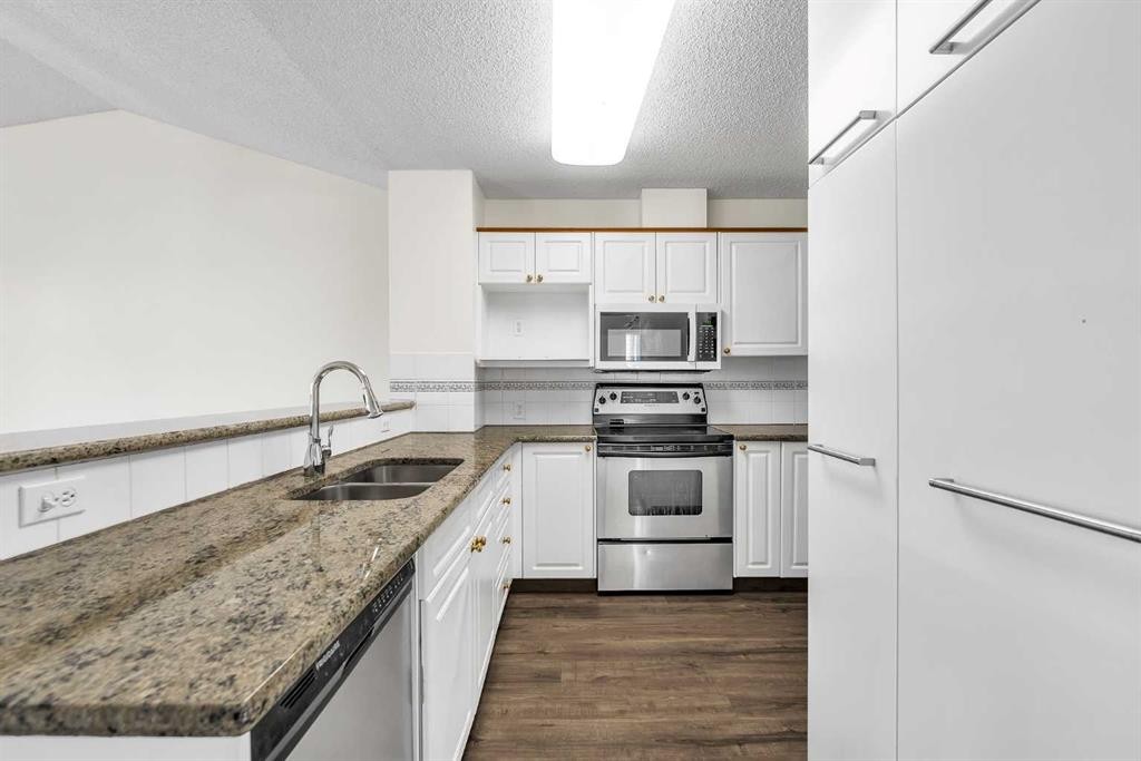 68 Catalina Circle Ne, Calgary, AB - Indoor Photo Showing Kitchen With Stainless Steel Kitchen With Double Sink