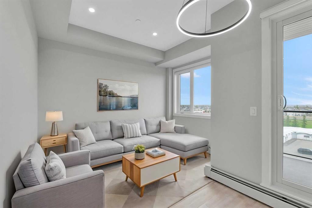 516-8230 Broadcast Avenue Sw, Calgary, AB - Indoor Photo Showing Living Room