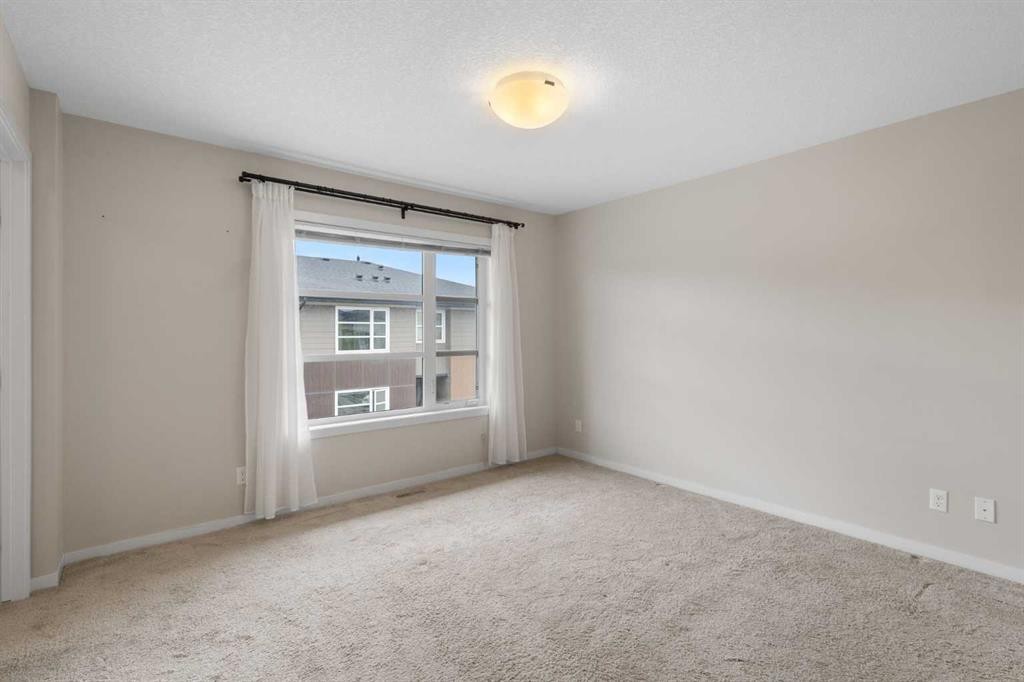 506 Evansridge Park Nw, Calgary, AB - Indoor Photo Showing Other Room