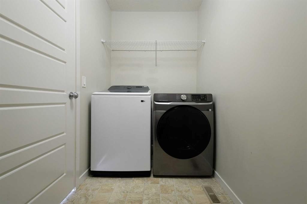 506 Evansridge Park Nw, Calgary, AB - Indoor Photo Showing Laundry Room