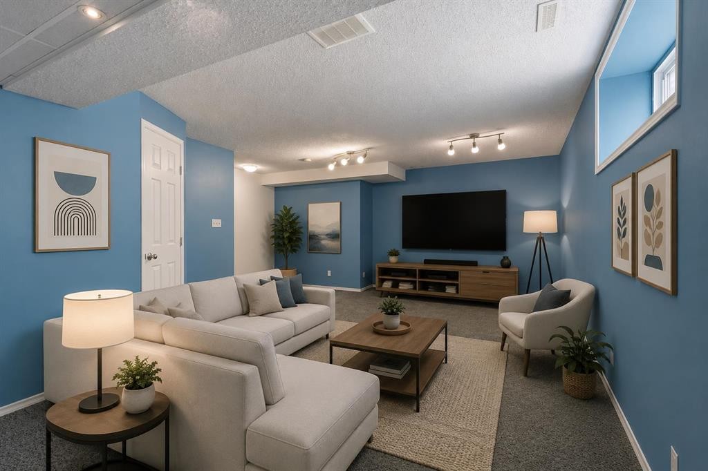 49 Evermeadow Manor Sw, Calgary, AB - Indoor Photo Showing Living Room
