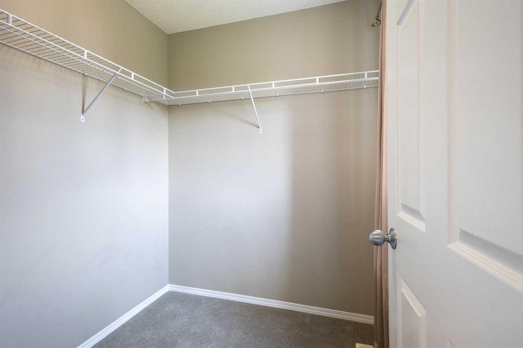 49 Evermeadow Manor Sw, Calgary, AB - Indoor With Storage