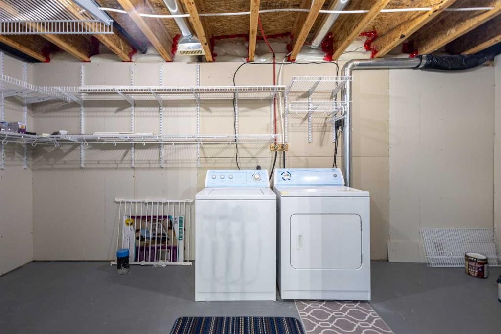 49 Evermeadow Manor Sw, Calgary, AB - Indoor Photo Showing Laundry Room