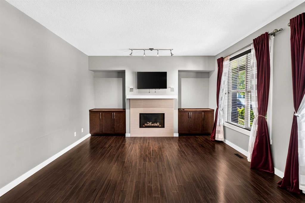 235 Mckenzie Towne Link Se, Calgary, AB - Indoor With Fireplace