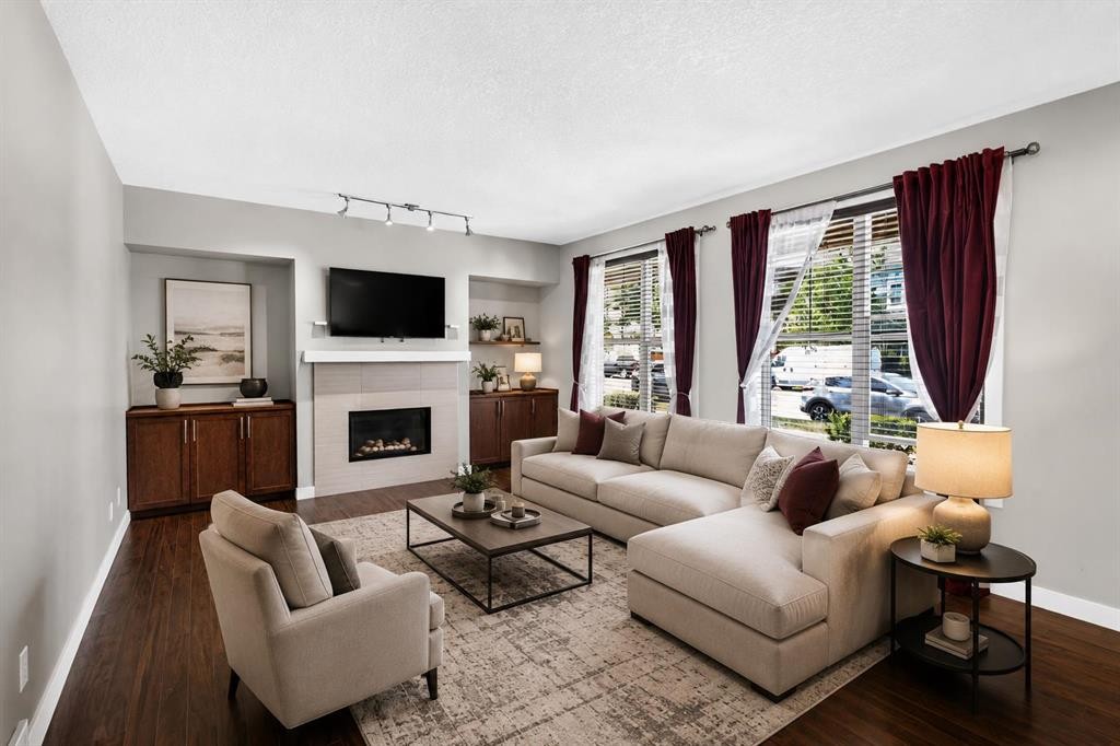 235 Mckenzie Towne Link Se, Calgary, AB - Indoor Photo Showing Living Room With Fireplace