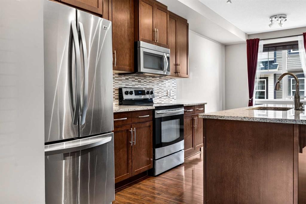 235 Mckenzie Towne Link Se, Calgary, AB - Indoor Photo Showing Kitchen With Upgraded Kitchen