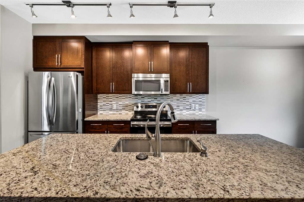 235 Mckenzie Towne Link Se, Calgary, AB - Indoor Photo Showing Kitchen With Upgraded Kitchen