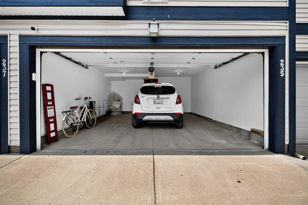 235 Mckenzie Towne Link Se, Calgary, AB - Indoor Photo Showing Garage
