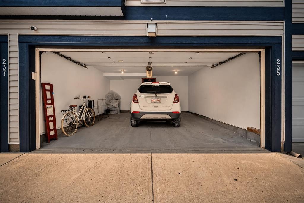 235 Mckenzie Towne Link Se, Calgary, AB - Indoor Photo Showing Garage