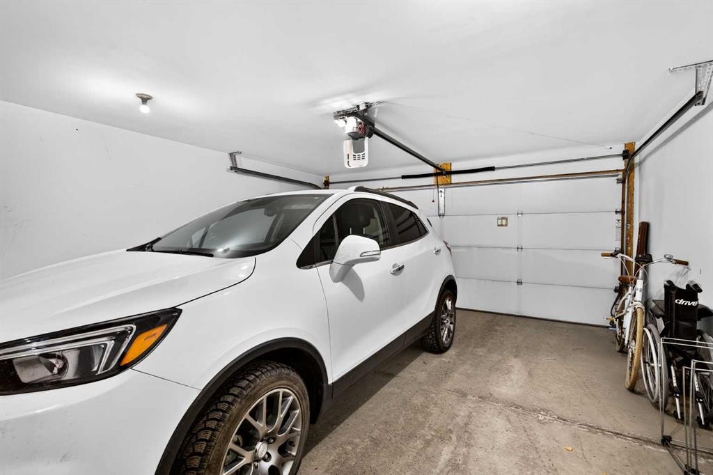 235 Mckenzie Towne Link Se, Calgary, AB - Indoor Photo Showing Garage