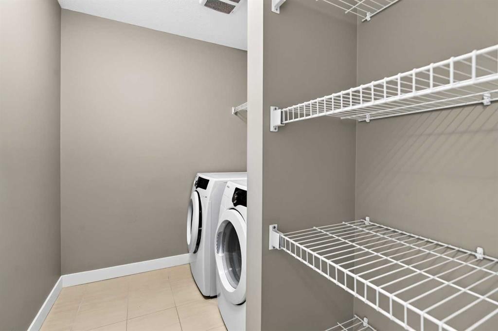 235 Mckenzie Towne Link Se, Calgary, AB - Indoor Photo Showing Laundry Room