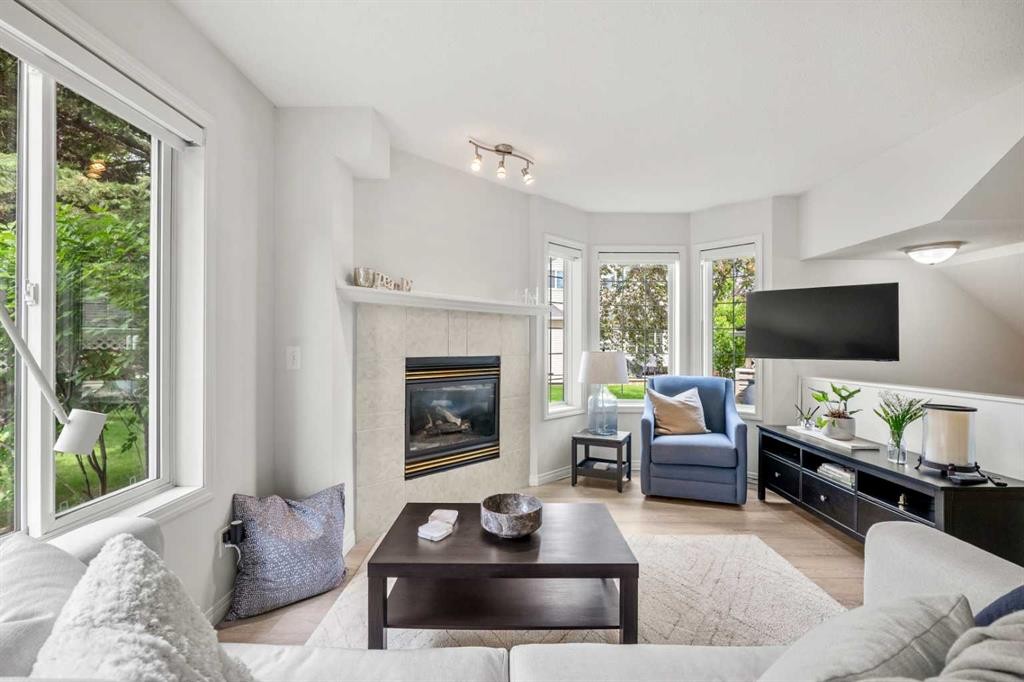 40 Chaparral Ridge Terrace Se, Calgary, AB - Indoor Photo Showing Living Room With Fireplace