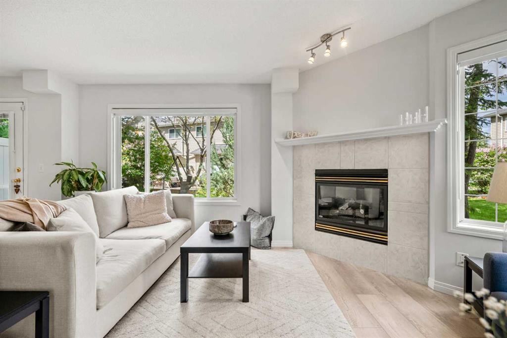 40 Chaparral Ridge Terrace Se, Calgary, AB - Indoor Photo Showing Living Room With Fireplace