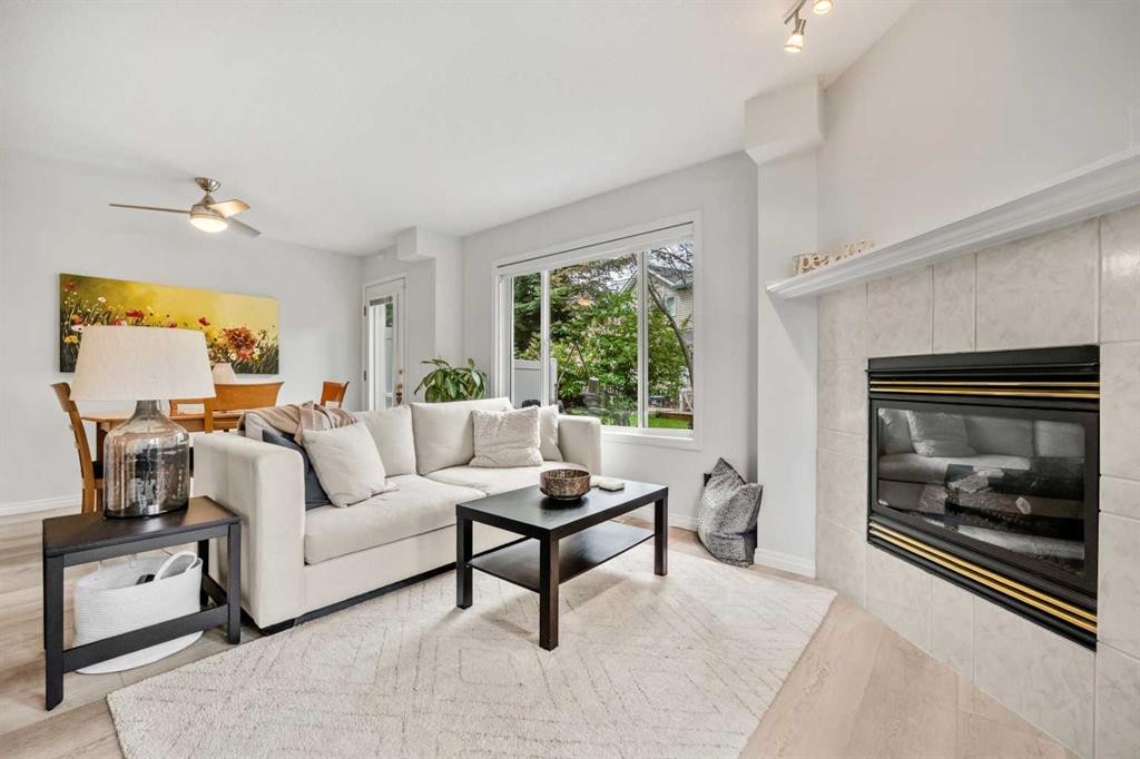 40 Chaparral Ridge Terrace Se, Calgary, AB - Indoor Photo Showing Living Room With Fireplace