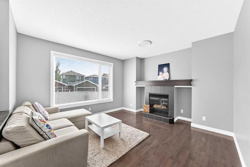 29 Redstone Manor, Calgary, AB - Indoor Photo Showing Living Room With Fireplace