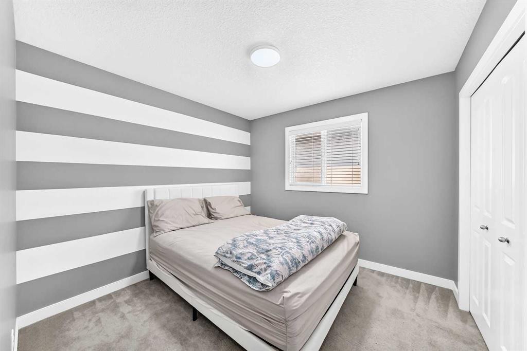 29 Redstone Manor, Calgary, AB - Indoor Photo Showing Bedroom