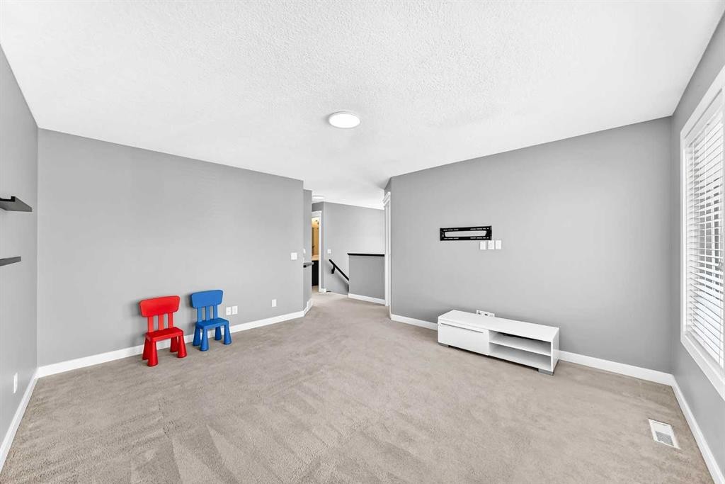 29 Redstone Manor, Calgary, AB - Indoor Photo Showing Other Room