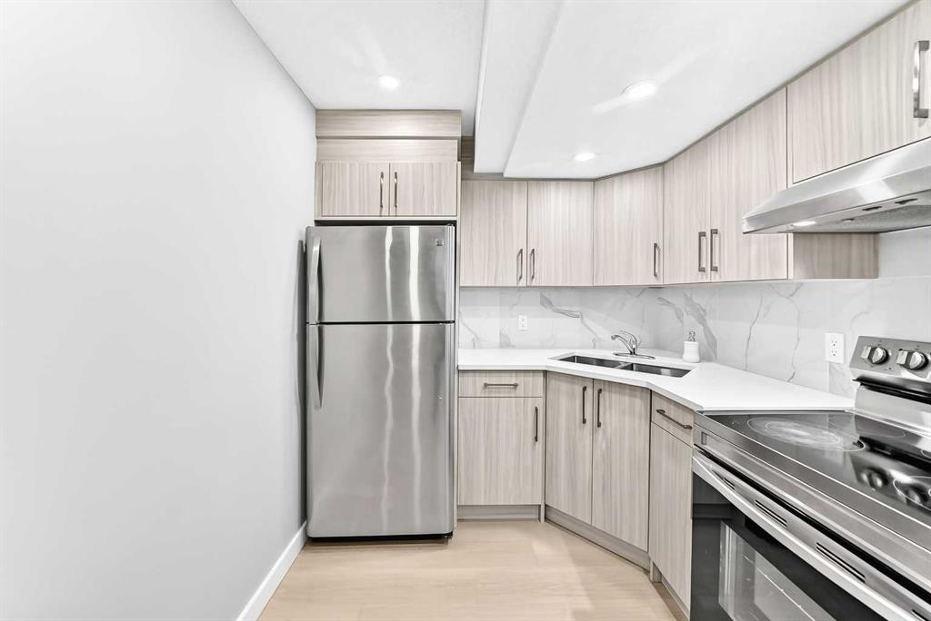 29 Redstone Manor, Calgary, AB - Indoor Photo Showing Kitchen With Double Sink
