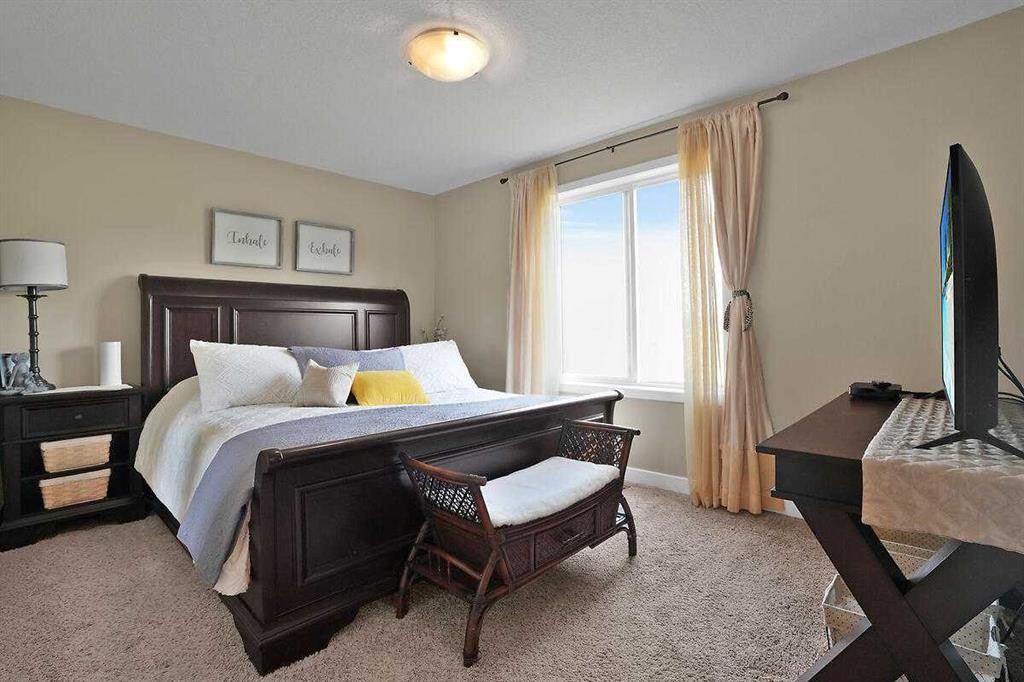 460 Seclusion Valley Drive, Diamond Valley, AB - Indoor Photo Showing Bedroom