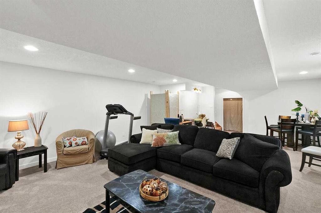 460 Seclusion Valley Drive, Diamond Valley, AB - Indoor Photo Showing Living Room
