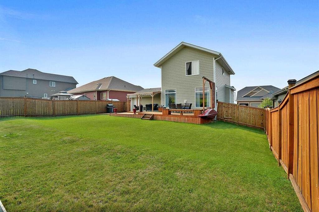 460 Seclusion Valley Drive, Diamond Valley, AB - Outdoor With Deck Patio Veranda With Backyard With Exterior