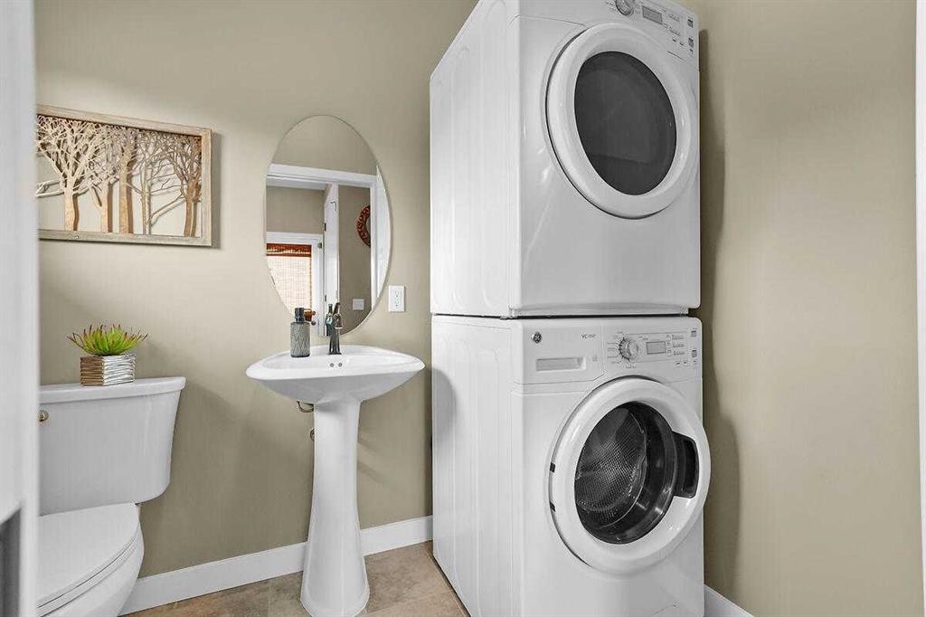 460 Seclusion Valley Drive, Diamond Valley, AB - Indoor Photo Showing Laundry Room