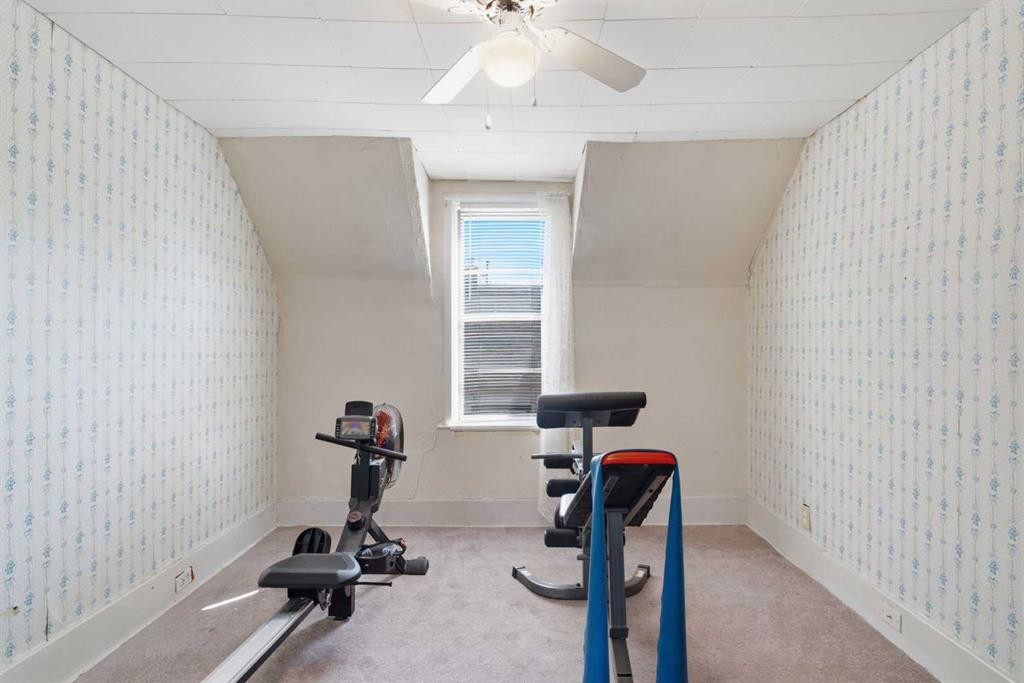432 Centre Avenue Ne, Airdrie, AB - Indoor Photo Showing Gym Room