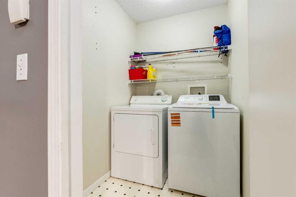4203-385 Patterson Hill Sw, Calgary, AB - Indoor Photo Showing Laundry Room