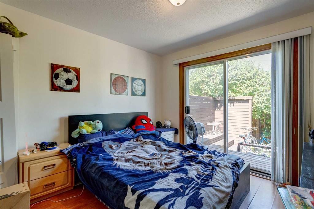 202 Olympia Drive Se, Calgary, AB - Indoor Photo Showing Bedroom