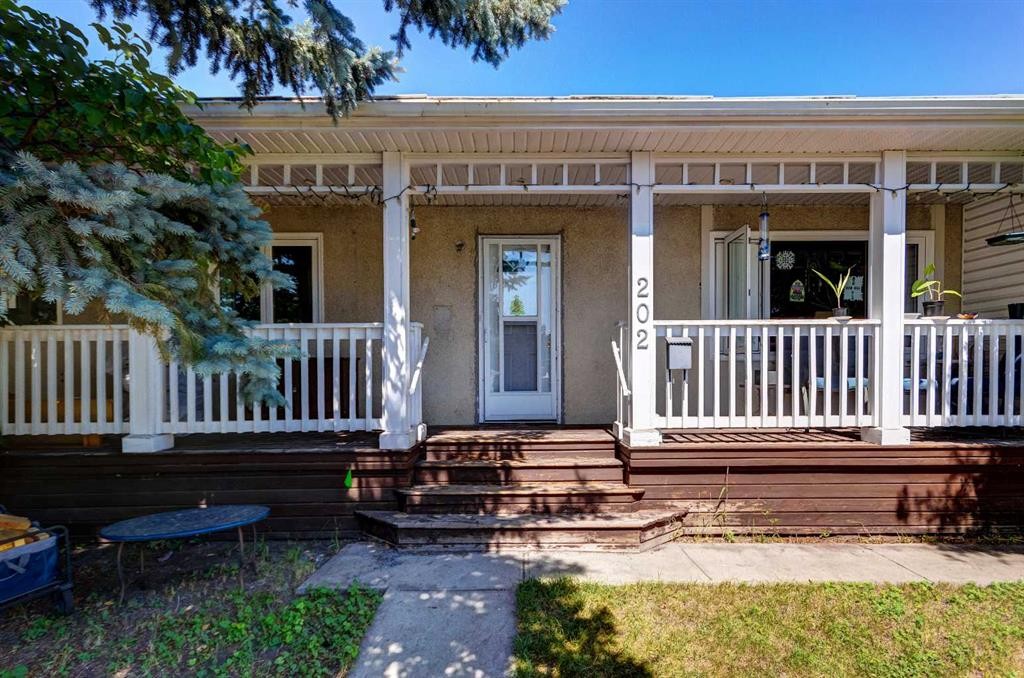 202 Olympia Drive Se, Calgary, AB - Outdoor With Deck Patio Veranda